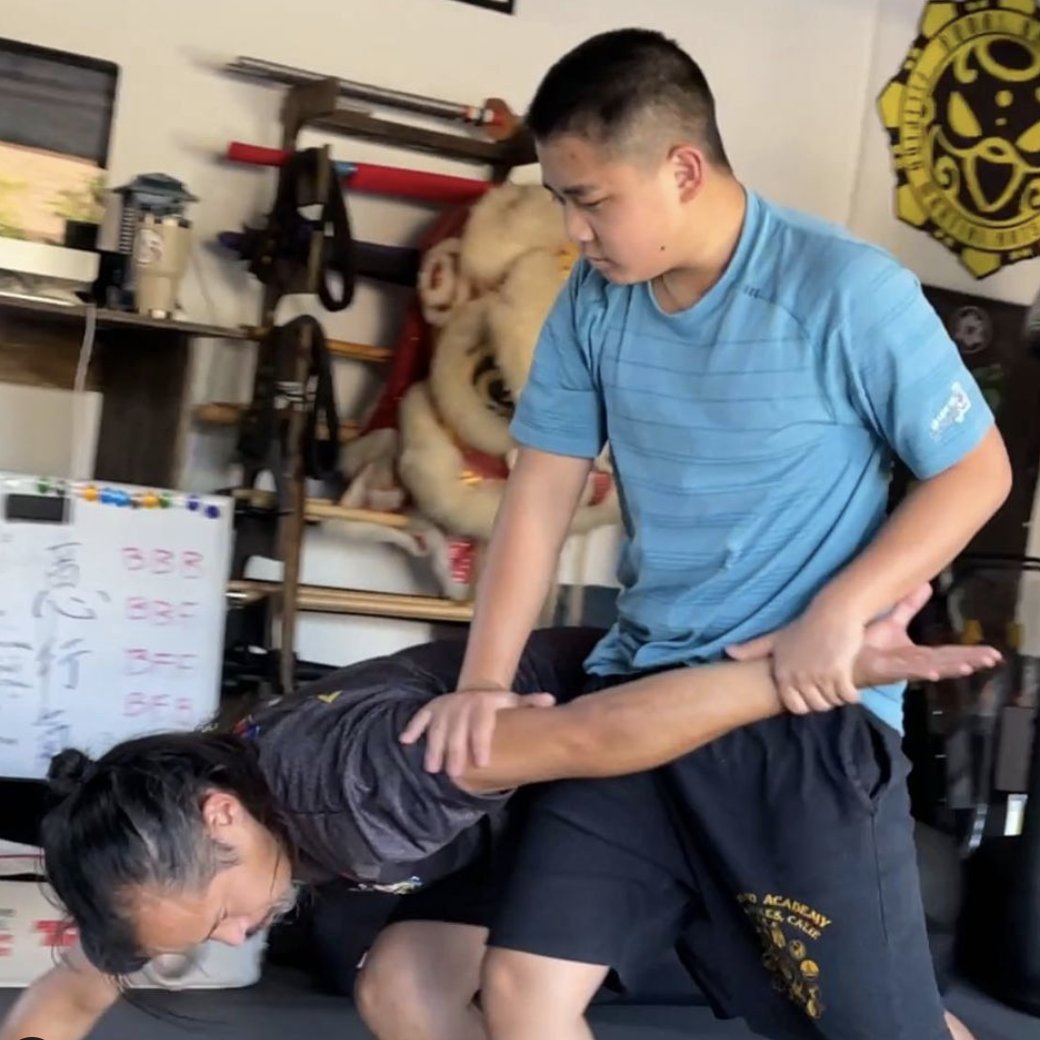 Dr Mark Cheng coaching a client